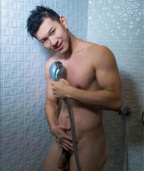 Shower boy with a soft cock